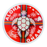 A circular vinyl decal with a turtle design, palm trees, and the text 'ALOHA' and 'OHANA' on a red background.