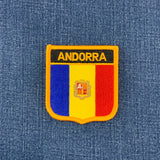 Andorra flag patch on a blue denim background