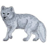 Embroidered patch of an arctic fox in white and grey colors on a white background
