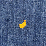 Yellow banana patch on blue denim fabric