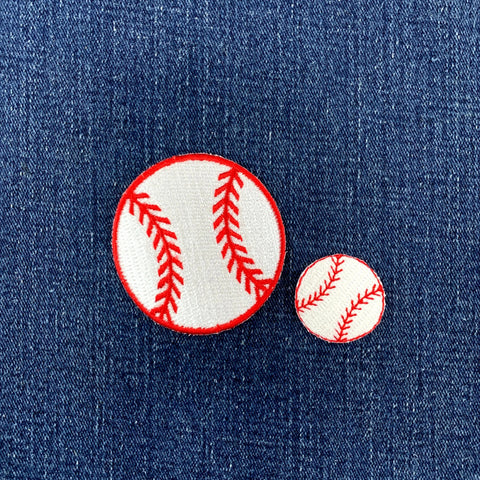 2 baseball patches, one small and one large, on a denim background