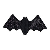 Black bat-shaped patch on a white background