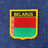 Belarus patch with red and green design on a blue denim background