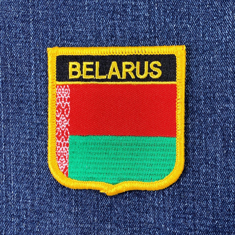 Belarus patch with red and green design on a blue denim background