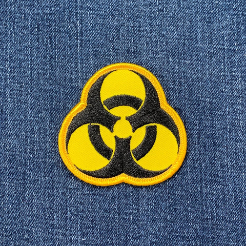 Biohazard symbol patch on denim fabric