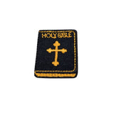 Black and yellow 'HOLY BIBLE' patch with a cross on a white background