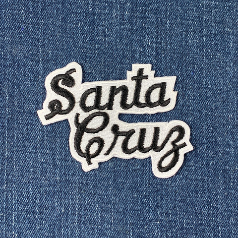 Patch with 'Santa Cruz' text on a denim background