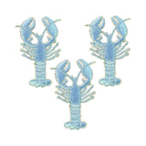Three embroidered lobster patches in light blue arranged on a plain white background.