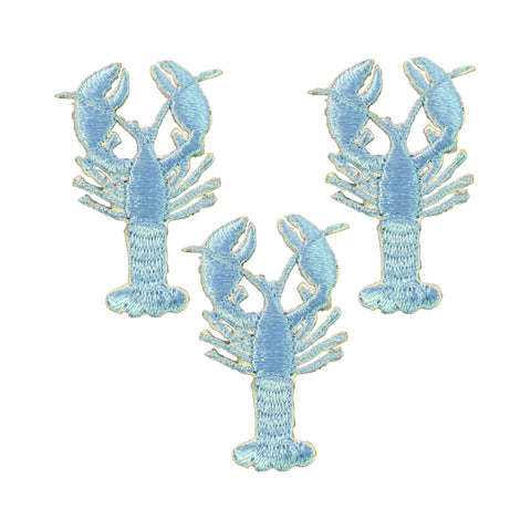 Three embroidered lobster patches in light blue arranged on a plain white background.