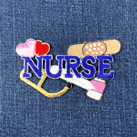 Embroidered patch on denim fabric with 'NURSE' text and medical symbols.