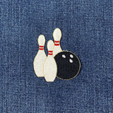 Bowling pin and ball patch on denim fabric