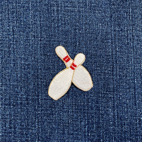 Bowling pin patch on denim fabric