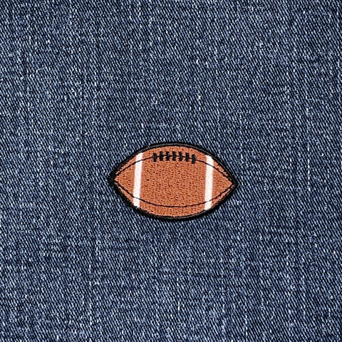 Football patch on a denim background