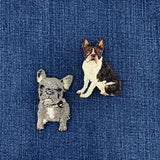 Two dog patches on a denim fabric background