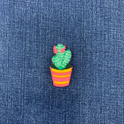 Cactus-shaped patch on a denim background