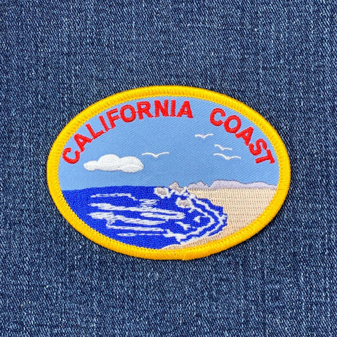 Patch with 'California Coast' design on a denim background