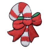 candy cane patch with a red and green bow on a white background