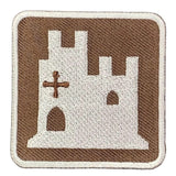 embroidered castle sign patch on a white background