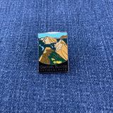 Pin with Channel Islands National Park design on a blue denim background