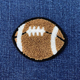 Football patch on a denim background