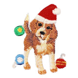 Embroidered patch of a beagle dog wearing a red Santa hat, surrounded by colorful Christmas ornaments on a white background.