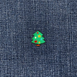 Colorful Christmas tree patch on denim fabric
