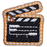 Patch of a clapperboard with orange border on a white background