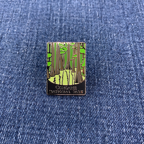 Pin with congaree national park design on a blue denim background