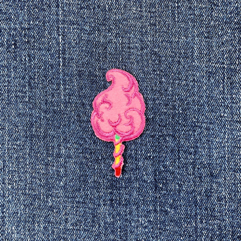 Pink cotton candy patch on denim fabric