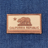 desert camo DCU California Republic patch on blue denim fabric