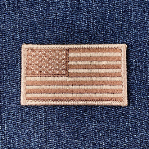 Desert Camo DCU American flag patch on a denim background