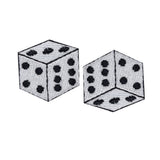 two embroidered dice patches on a white background