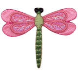 Dragonfly-shaped patch with pink wings and a green body on a white background