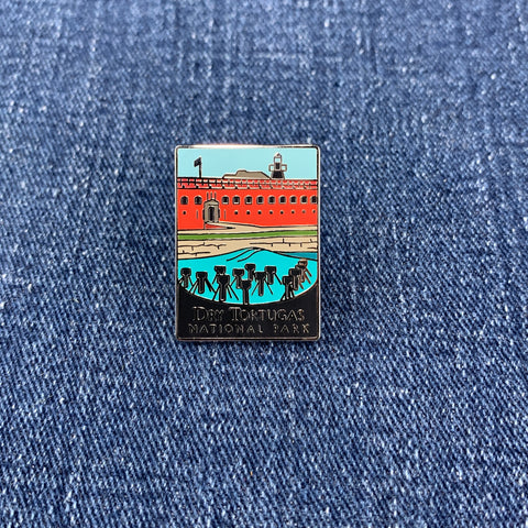 Pin with image of Dry Tortugas National Park on a denim background