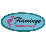 Oval-shaped embroidered patch with a pink flamingo on the left side and the text 'Flamingo Trailer Park' on the bottom. 