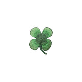 Green four-leaf clover patch on a white background