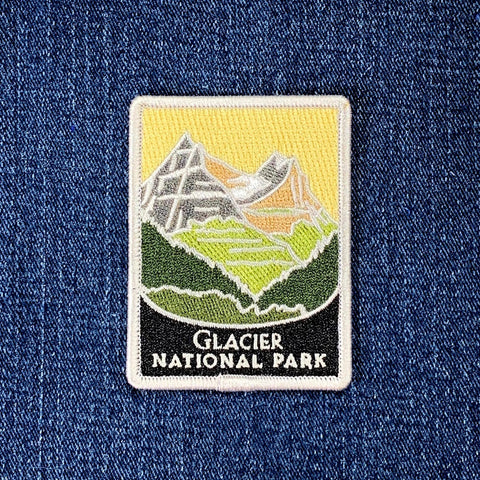 Embroidered patch of Glacier National Park on denim fabric