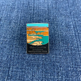 Pin with Glen Canyon National Recreation Area design on a blue denim background