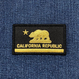 California Republic patch with bear and star design on blue denim fabric