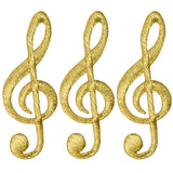 Three gold-colored iron-on patches with a musical note design, arranged side by side.