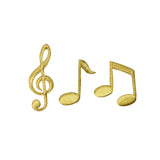 gold note and G clef patches on a white background