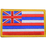 Embroidered patch of the Hawaiian flag on a white background