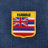 Hawaii state flag shield patch on a denim background