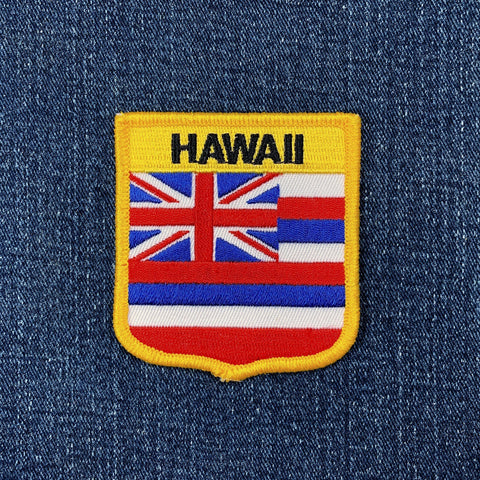 Hawaii state flag shield patch on a denim background