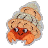 Embroidered patch of a hermit crab on a white background