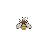 Embroidered bee patch on a white background