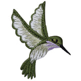 An embroidered hummingbird patch shown against a plain white background. The patch features olive green and white stitched feathers with a light purple throat and a black beak.