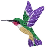 Embroidered patch of a colorful hummingbird on a white background