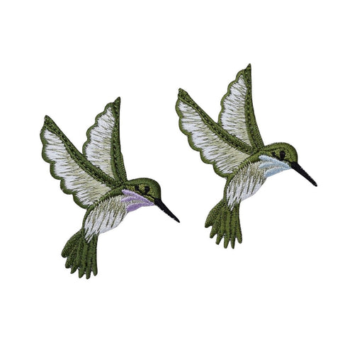 Two embroidered hummingbird patches on a white background