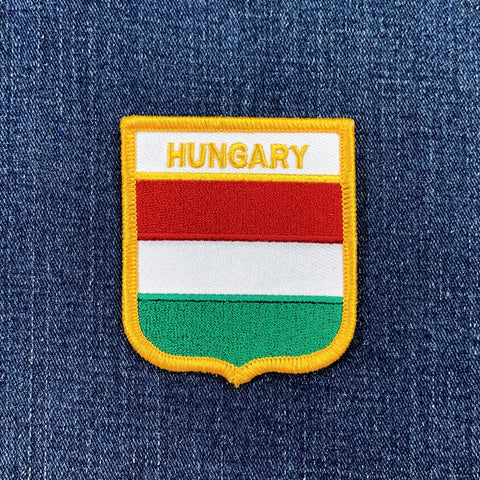 Embroidered patch of the Hungarian flag on a denim background